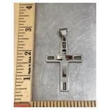 Silver tone cross pendant