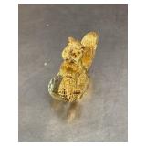 Gold tone squirrel with clear gem acorn