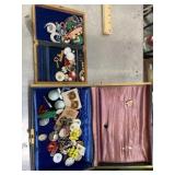 Vintage blue jewelry box with jewelry inside