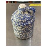 Vintage blue and white jug with white cork