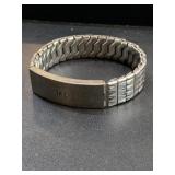 Silver tone bracelet with name carolyn