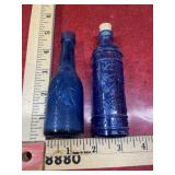 2 old blue bottles