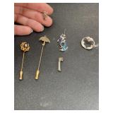 Miscellaneous pins and unmatched earrings