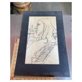 Charcoal sketch of woman's face, signed.