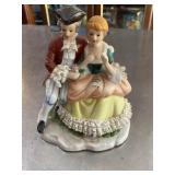 Vintage porcelain colonial couple