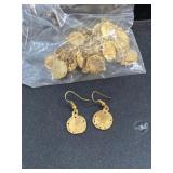 Many gold tone sand dollar dangle earrings