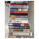 13 VHS movies and 2 DVD movies untested