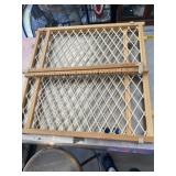 Wooden baby gate with some tear on it