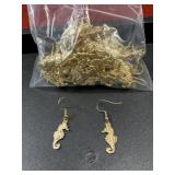 Many gold tone seahorse dangling earrings