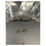 Many silver tone dolphin earrings with rainbow