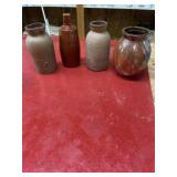 4 stoneware bottles / vases 7 to 9 inches tall