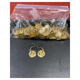 Many gold tone sand dollar dangle earrings