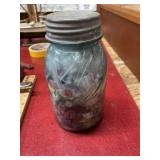Ball blue mason jar full of buttons