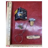 Vintage earlytimes pocket knife and 2 corks with