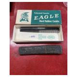 2 Vintage eagle hard rubber combs in original box