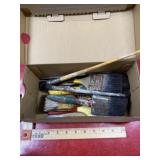 Vintage paint brushes in shoe box