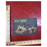 Vintage photograph post cards in book