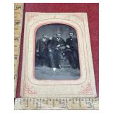 Antique tin type photo in paper frame