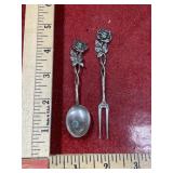 Marked .835 silver small spoon and fork set roses