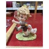 Porcelain boy and duck figurine 5.5 inches tall