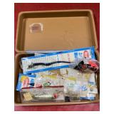 Vintage plastic box full with fishing supplies