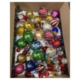 Box full with vintage glass Christmas ornaments