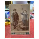 Vintage studio portrait 2 young lads and their