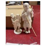 Vintage Asian bovine figurines fisherman and man