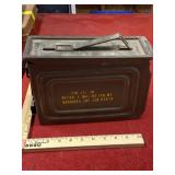 Vintage military metal storage can with items