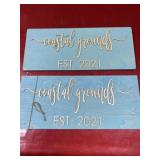 Two 10x23 coastal grounds wooden signs