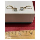 Gold tone with light blue gem stone pierced