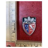 Vintage military shield pin marked Drago Paris
