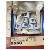 7 vintage porcelain thimbles with flower design