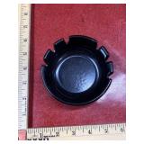 Black plastic ash tray