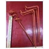 3 Vintage orange fishing rod holders