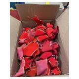 Box full of red ribbons