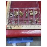 Clear box of wearable jewelry vintage and new