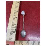Tiny spoon with polished pink stone