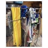 Box lot of assorted flags rack not included