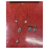 Silver tone with faux blue star sapphire stones