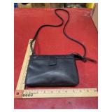 Small black clutch with strap