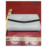Grey clutch with detachable strap