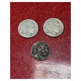 2 buffalo nickels and one 1943 steel penny