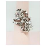 Silver tone size 5.75 ring with clear stones