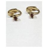 Gold tone clip on earrings with red stones