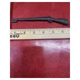 Vintage cast iron toy rifle