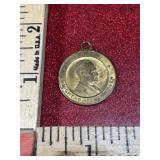 Gold tone President Dwight D Eisenhower medallion