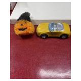 Toy car and squishy pumpkin toy