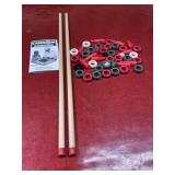 Carrom rule book, playing pieces, and 2 24-inch
