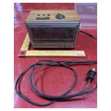 Vintage General Electric AM/FM clock radio with